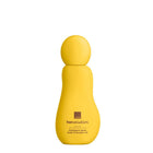 A bright yellow bottle of Her Wisdom Sim Sim Indulgent Glow bath & shower oil on a plain white background.
