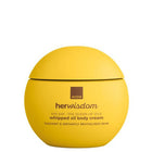 A round yellow Avon Her Wisdom Sim Sim whipped oil body cream jar on a plain white background.